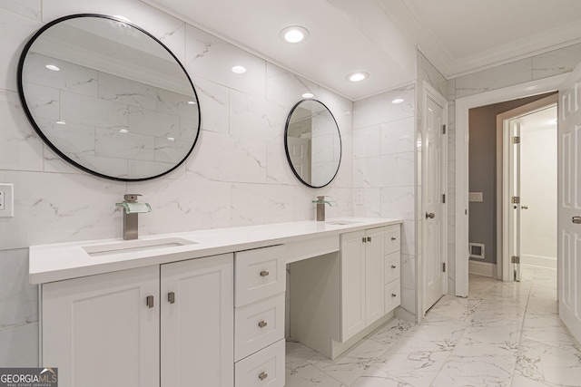 bathroom featuring vanity, crown molding, and tile walls