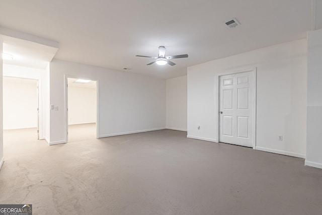 spare room with carpet flooring and ceiling fan