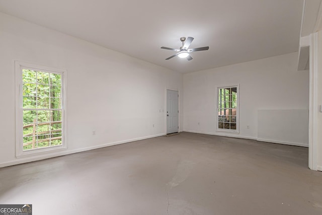 spare room with ceiling fan