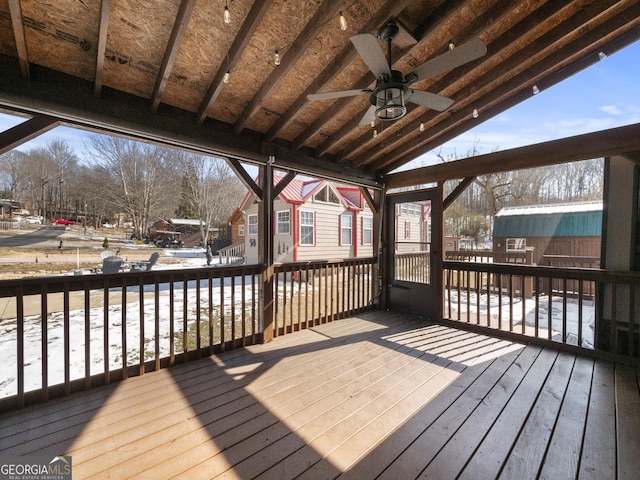 snow covered deck with ceiling fan