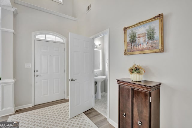 entrance foyer featuring light hardwood / wood-style floors