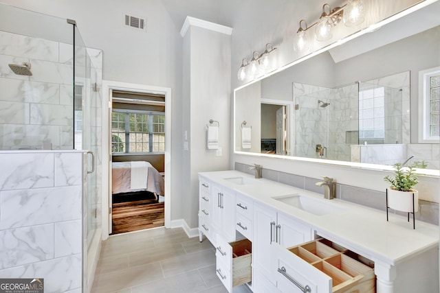 bathroom featuring vanity, tile patterned floors, an enclosed shower, and lofted ceiling