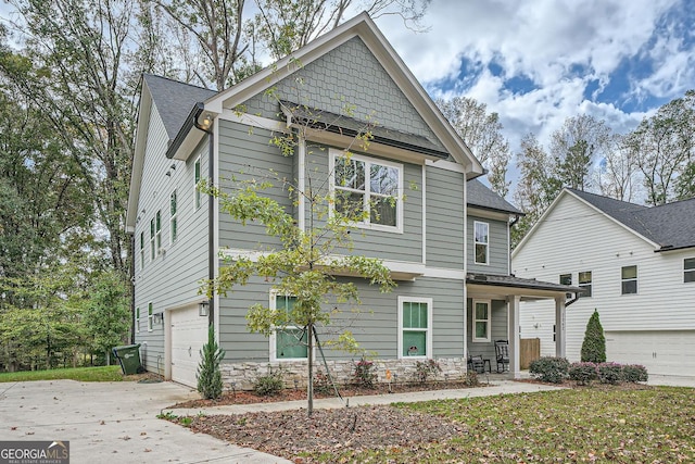 view of front of property featuring a garage