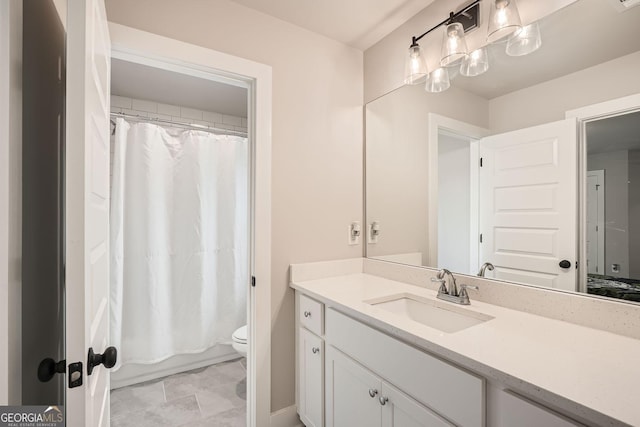 full bathroom featuring vanity, toilet, and shower / bath combo with shower curtain