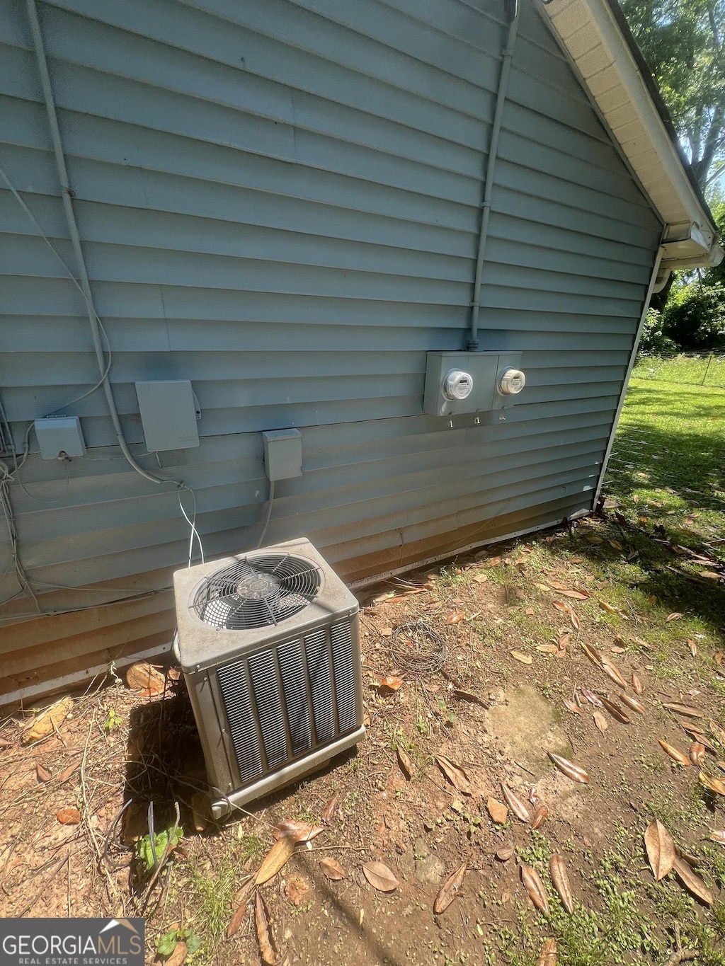 exterior details with central air condition unit