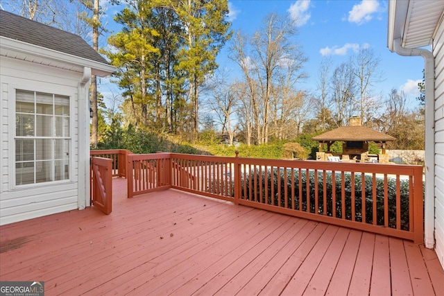 wooden terrace with a gazebo