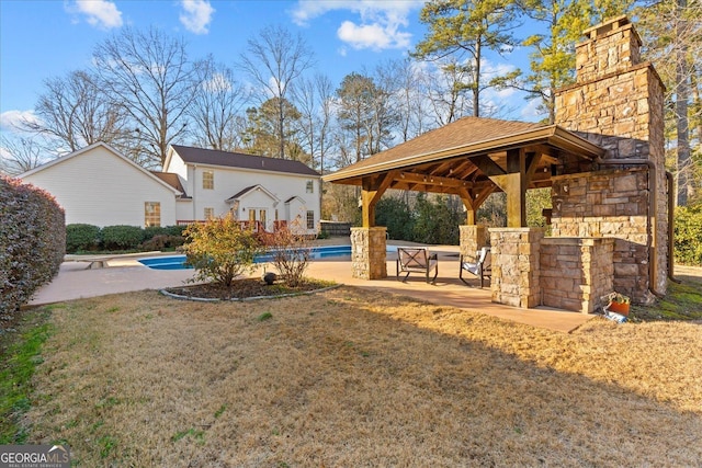 view of yard with a gazebo and a patio