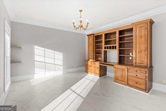 unfurnished office featuring crown molding, built in desk, and an inviting chandelier