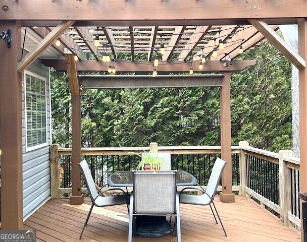 wooden deck with a pergola