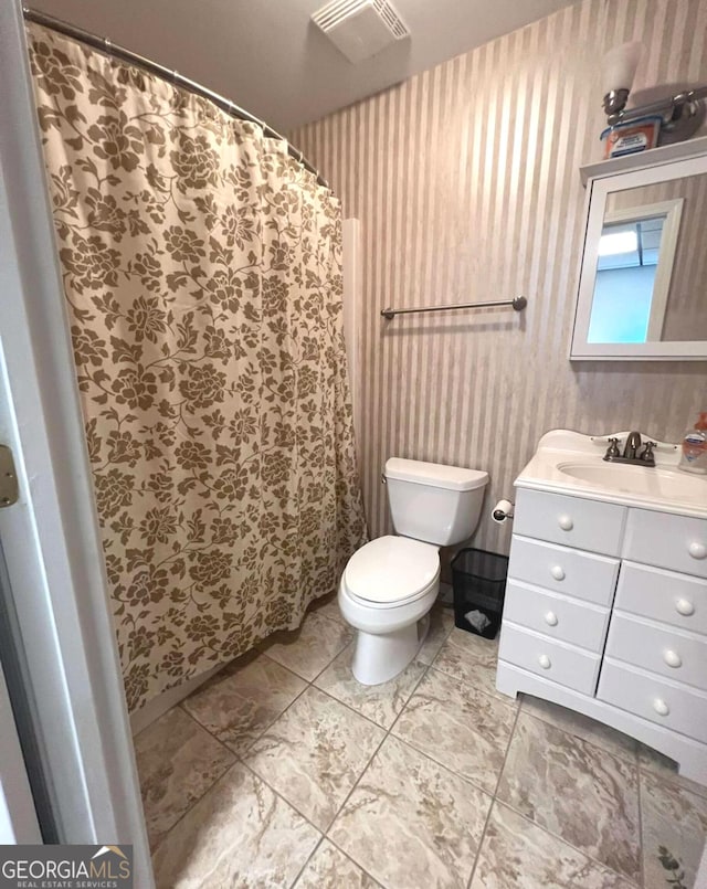 213 Moore Valley Way, Canton, GA 30115 - full bathroom featuring toilet, vanity, and wallpapered walls