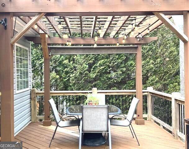213 Moore Valley Way, Canton, GA 30115 - wooden terrace with a pergola and outdoor dining area