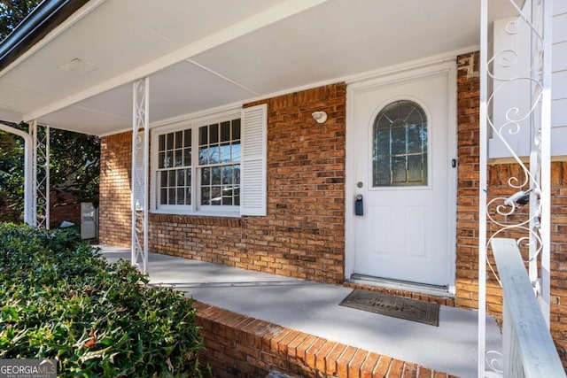 entrance to property with covered porch