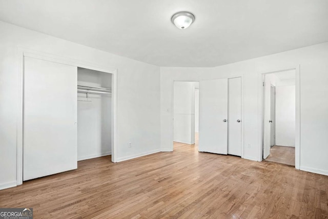 unfurnished bedroom with light hardwood / wood-style flooring