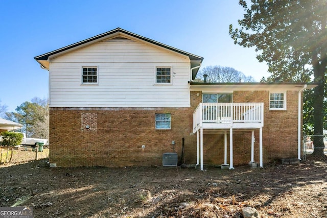 back of property featuring cooling unit