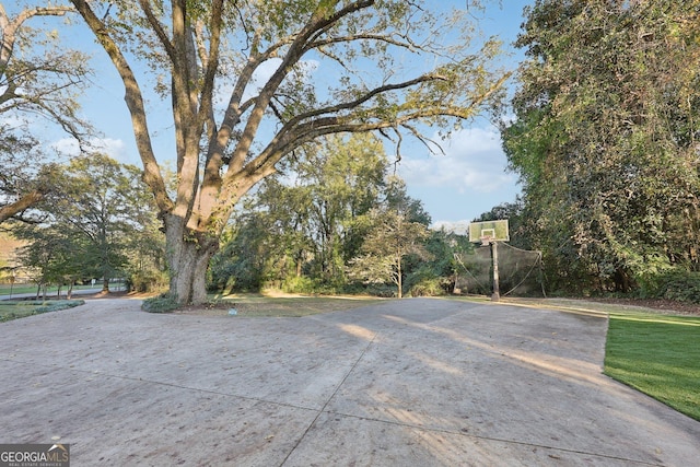 view of patio / terrace featuring basketball hoop