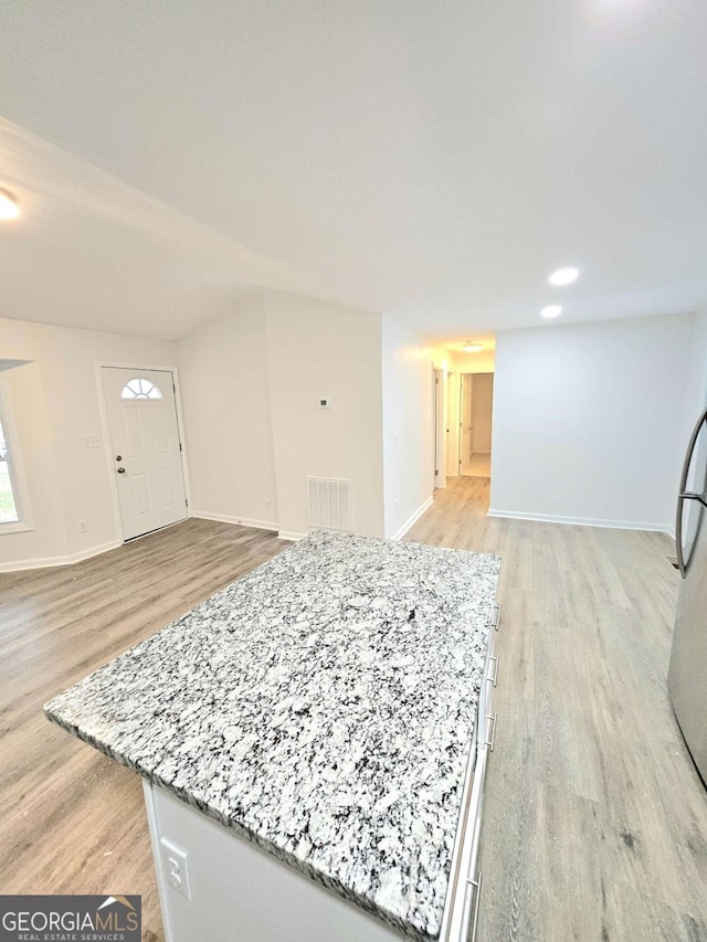 interior space with light hardwood / wood-style floors