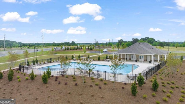 view of pool featuring a patio area