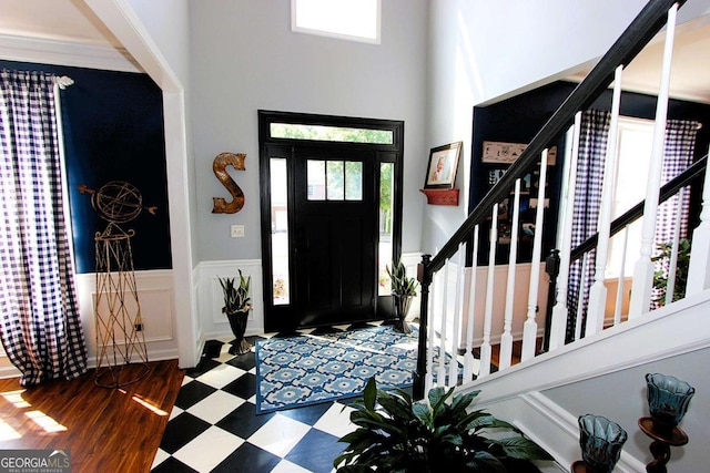 entrance foyer featuring dark hardwood / wood-style floors