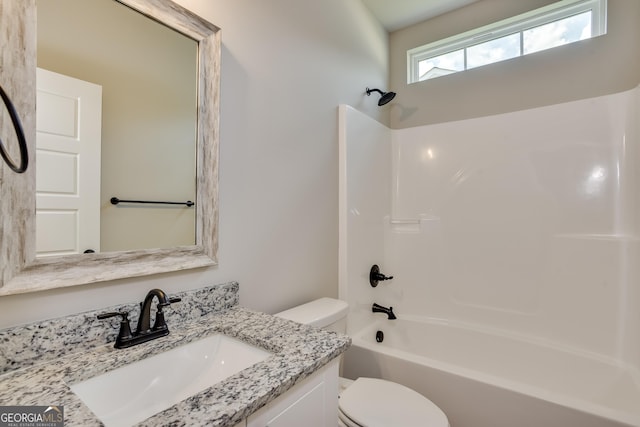 full bathroom with vanity, shower / bathtub combination, and toilet