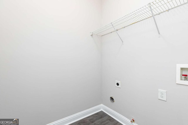 washroom with electric dryer hookup, gas dryer hookup, hookup for a washing machine, and hardwood / wood-style flooring