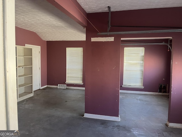 interior space with a textured ceiling