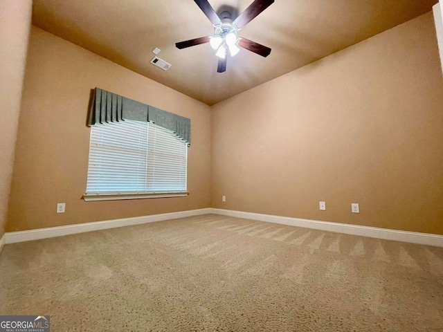 carpeted empty room with ceiling fan