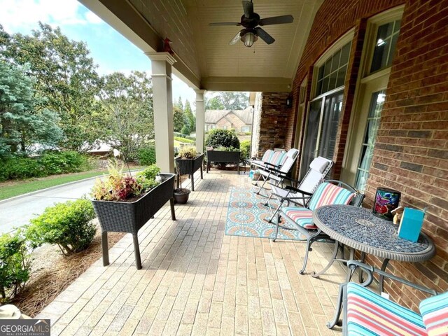 view of patio / terrace with ceiling fan