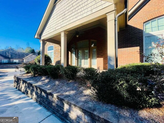 4140 Lanier Ridge Walk Unit 104, Cumming, GA 30041 - property entrance with brick siding