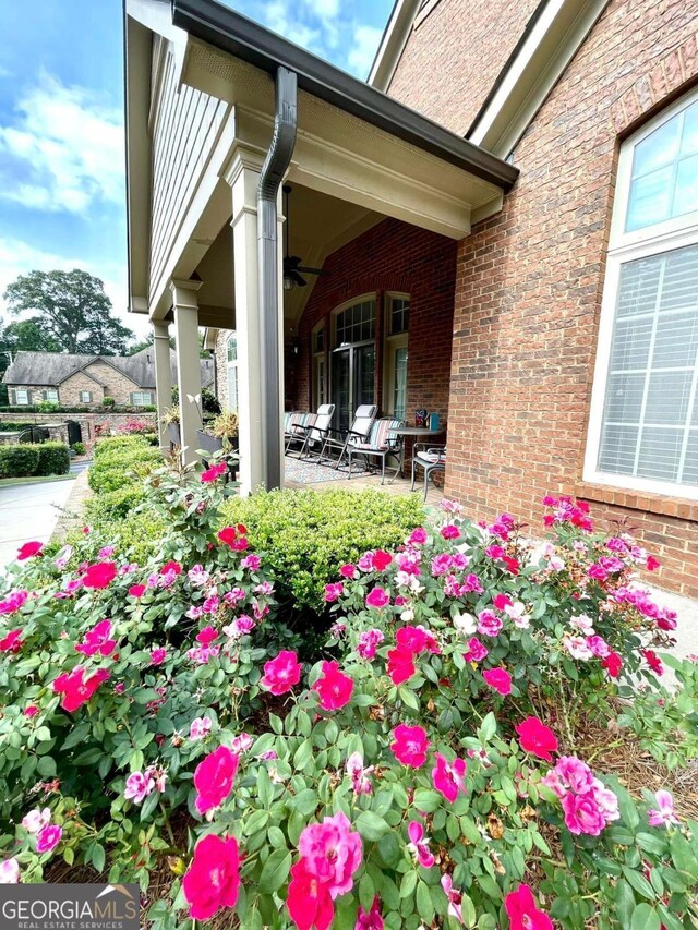 4140 Lanier Ridge Walk Unit 104, Cumming, GA 30041 - view of patio / terrace featuring ceiling fan