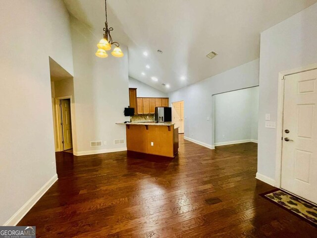 4140 Lanier Ridge Walk Unit 104, Cumming, GA 30041 - unfurnished living room featuring high vaulted ceiling and dark wood-type flooring