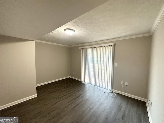 unfurnished room with crown molding, dark hardwood / wood-style flooring, and a textured ceiling