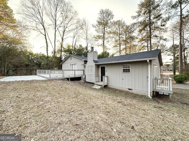 back of house with a patio area