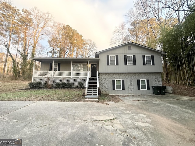 tri-level home featuring a porch