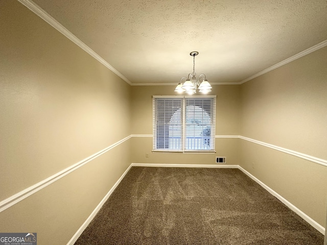 unfurnished dining area with a textured ceiling, a notable chandelier, carpet floors, and ornamental molding