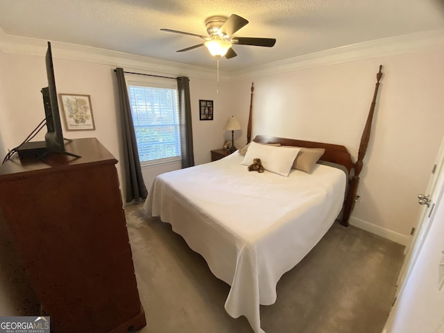 bedroom with ceiling fan, dark carpet, ornamental molding, and a textured ceiling