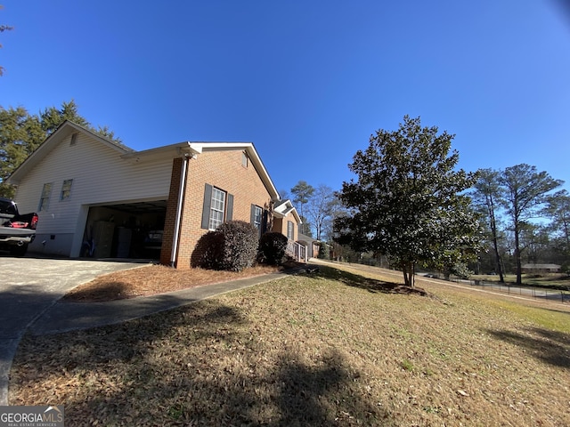 view of home's exterior with a yard