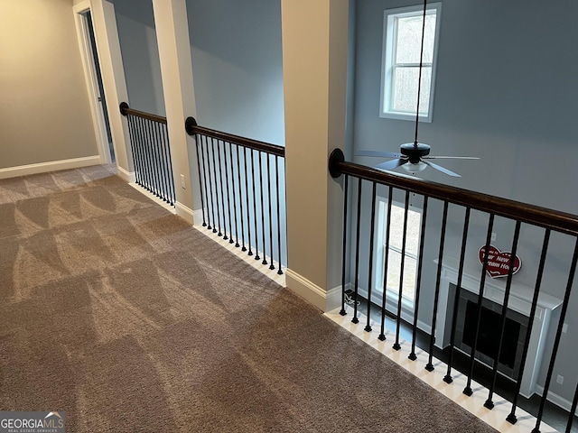 hallway with carpet