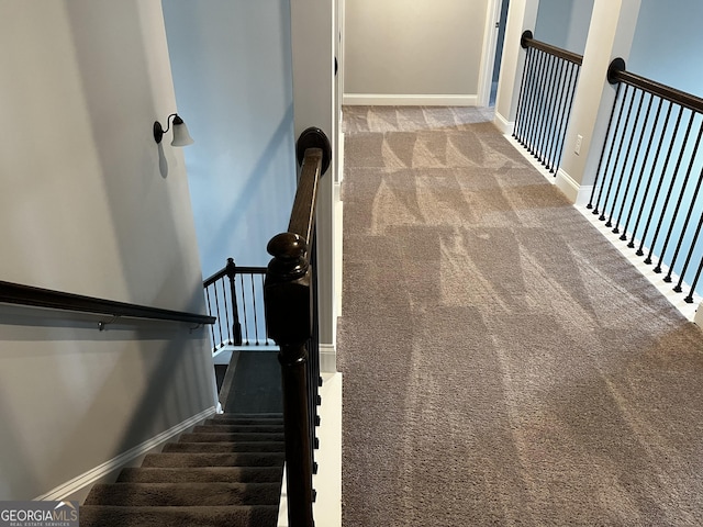 stairway with carpet floors