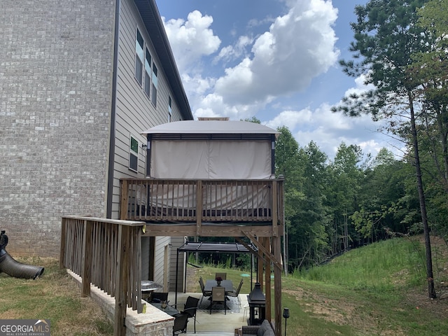 exterior space featuring a gazebo and grilling area