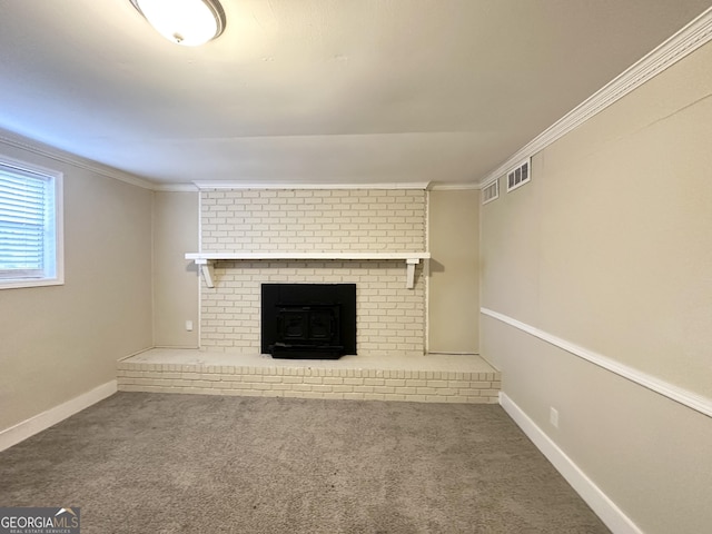 unfurnished living room featuring carpet flooring, a fireplace, and crown molding