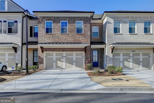 multi unit property featuring a garage