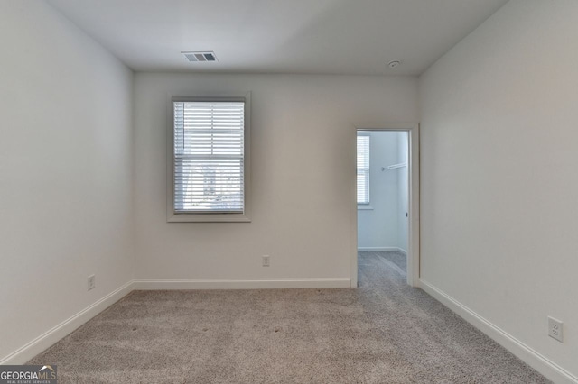 view of carpeted spare room