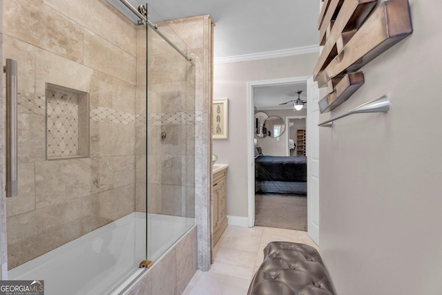 bathroom with crown molding, ceiling fan, vanity, enclosed tub / shower combo, and tile patterned flooring