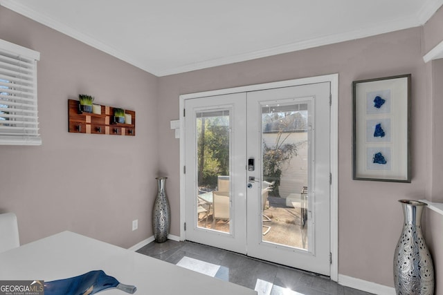 doorway to outside with ornamental molding and french doors