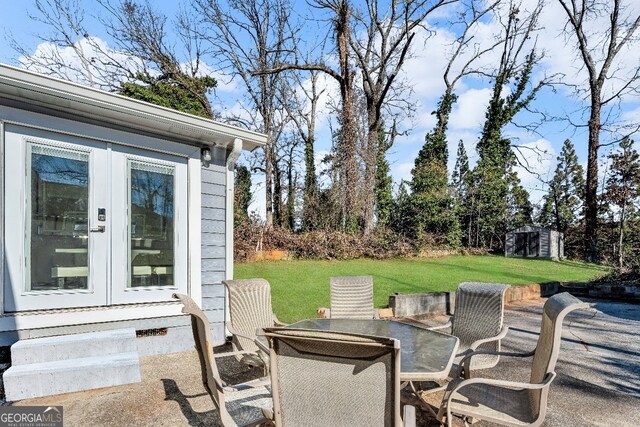 view of patio featuring french doors