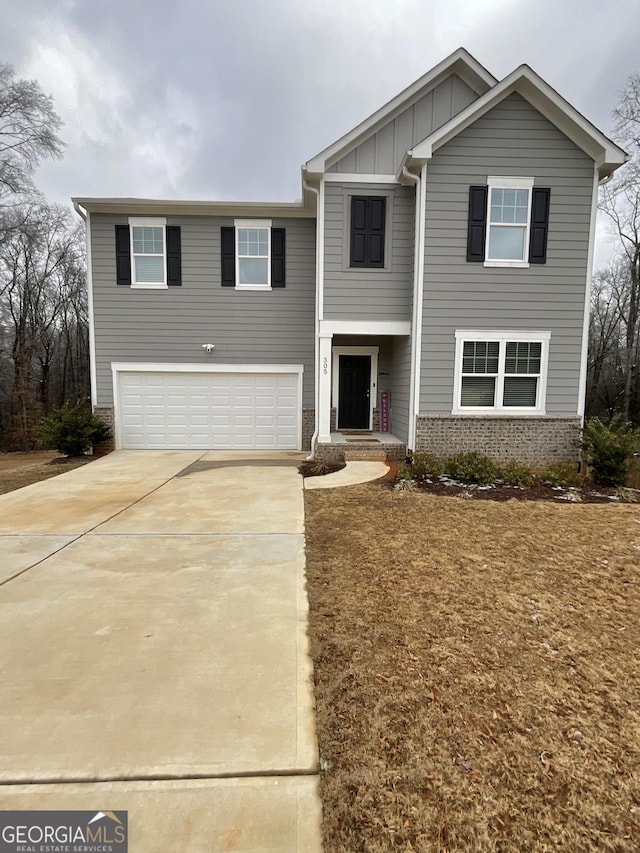 view of front of property with a garage