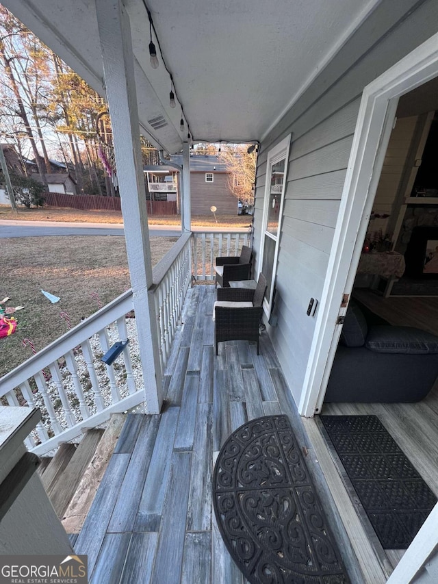 deck with a porch