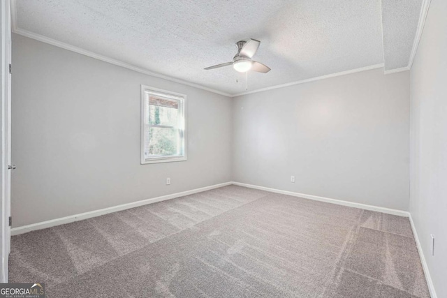 unfurnished room with carpet flooring, ceiling fan, ornamental molding, and a textured ceiling