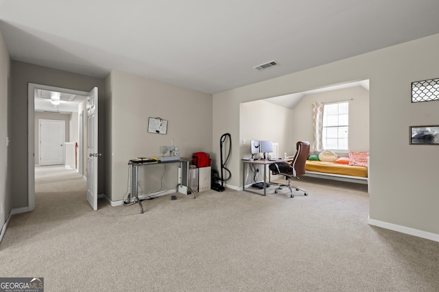 home office with light colored carpet