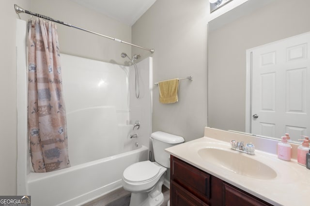 full bathroom featuring shower / bath combo with shower curtain, toilet, and vanity